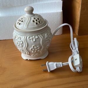 Electric candle melt